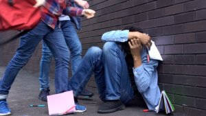 Racial harassment in school is illegal and must be stopped.